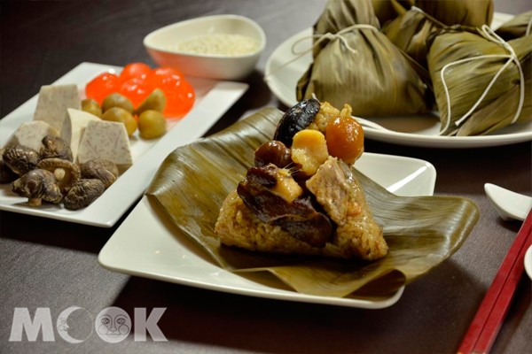 干貝燒肉粽使用精選干貝、九孔鮑魚等頂級特色食材。（圖片提供／台北富信大飯店）