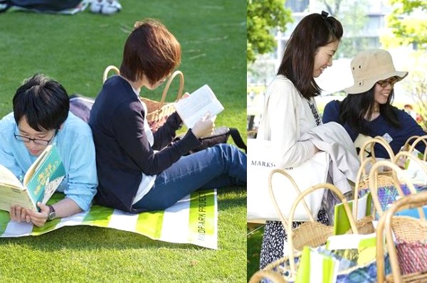 六本木中城「OPEN THE PARK」活動也推行草地上閱讀的樂活體驗。(圖片來源／Midtowm)