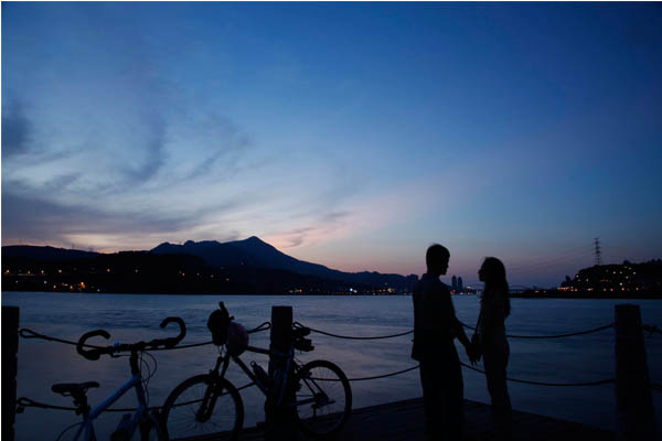 如果在黃昏時候來社子島騎乘單車，可將夕照美景收進眼底。(圖片來源／台北市政府觀旅局台北旅遊網）